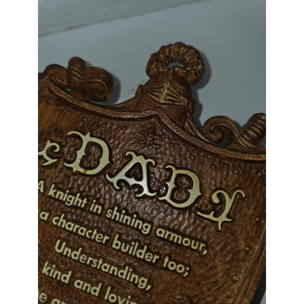 vintage faux wood composite shield-shaped wall plaque featuring a 